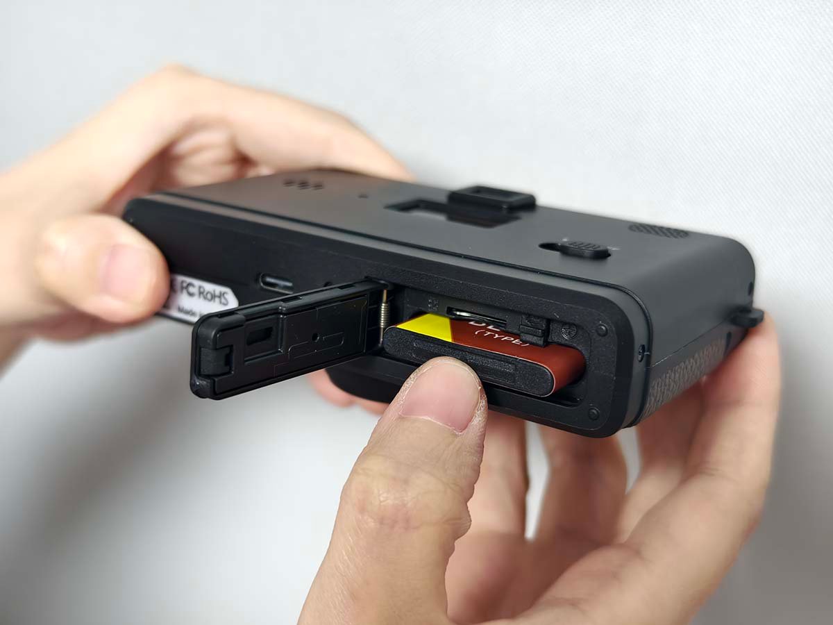Inserting the battery and microSD card