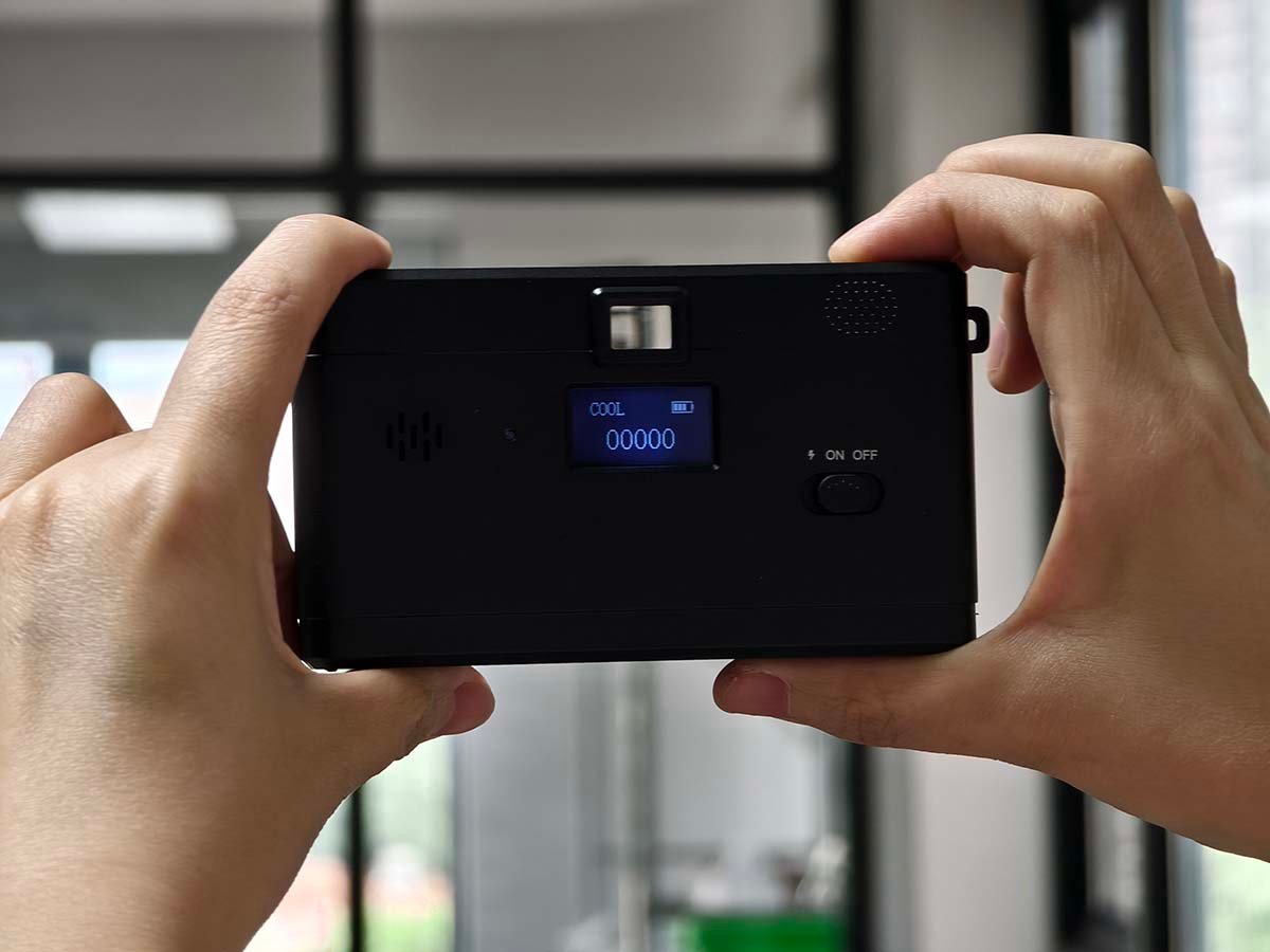 Taking a photo through the viewfinder